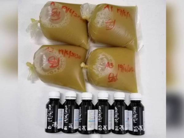 Air ketum dan ubat batuk yang dirampas di sebuah rumah di Rantau Panjang, Klang, kelmarin.