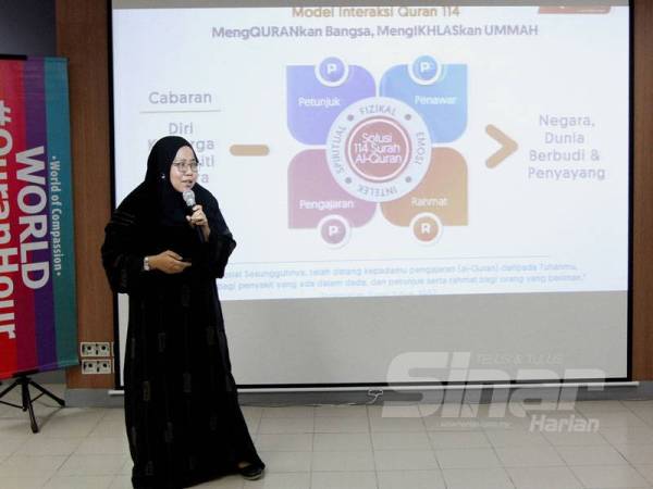 Marhaini memberi penerangan mengenai program MY#QuranTime yang dilaksanakan kepada sahabah al-Quran digital.