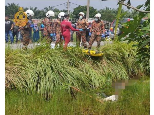 Mayat mangsa warga Thailand ditemui mati dalam parit di Jalan Parit Omar, Kampung Bukit Kuching di sini semalam. (Gambar ihsan Balai Bomba dan Penyelamat Kuala Selangor)