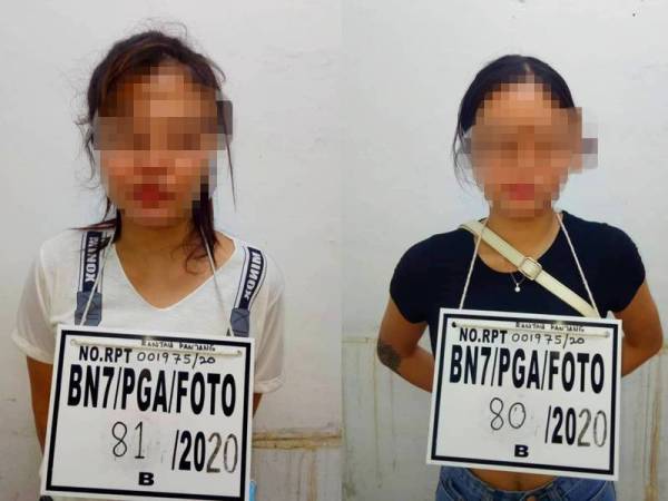 Dua PATI warga Laos ditahan anggota PGA di pangkalan haram kotak.