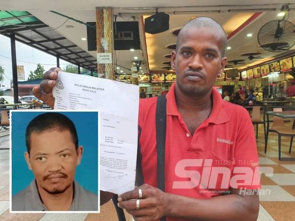 Arumugam menunjukkan laporan polis yang dibuat berikutan kehilangan abangnya sejak Januari lalu.