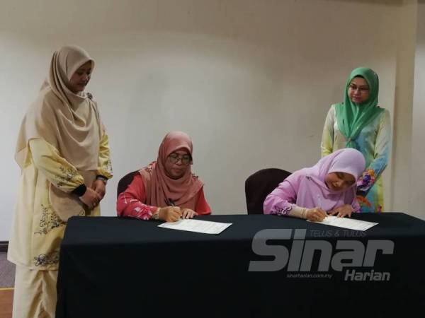 Majlis MoU antara APS dan Telekung Nur Hidayah (TNH) berlangsung di Hotel Raia di sini hari ini.