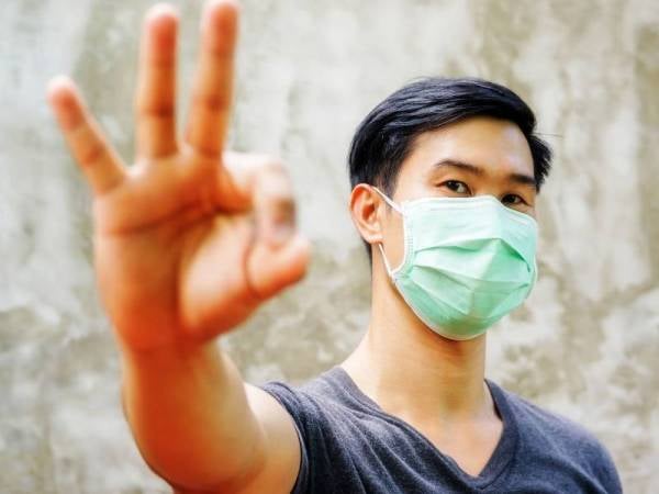 Pihak berkuasa sedang berbincang bagi menetapkan tarikh perwartaan pemakaian pelitup muka. - Foto 123RF