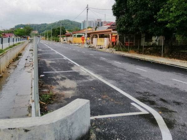 Kemudahan jalan baharu dan sistem perparitan yang lebih besar bagi menangani masalah banjir di kawasan Kampung Baru Slim River.