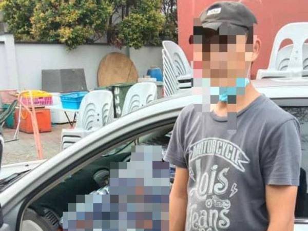 Suspek yang ditahan bersama arak yang dirampas PPM Wilayah Dua menerusi dua sebuan di sekitar Johor Bahru semalam.