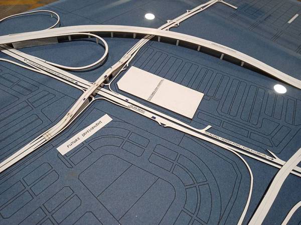 Beri idea untuk reka  bentuk  persimpangan bertingkat