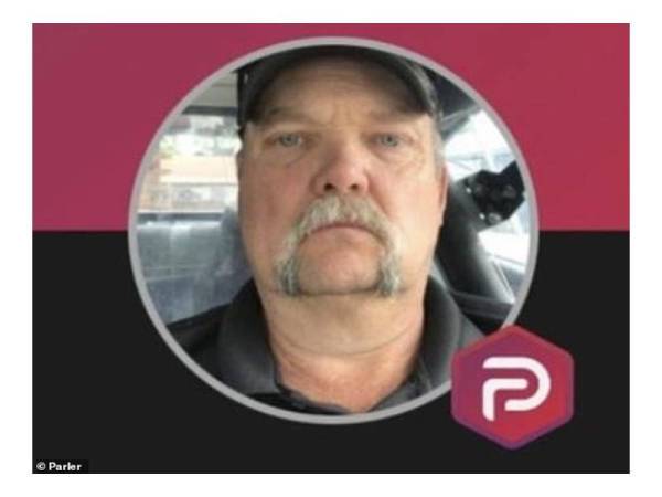 Gambar menunjukkan wajah bekas Ketua Polis Marshall, Lang Holland di laman sosial Parler. - Foto Parler