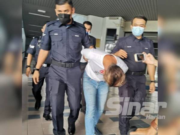 Tertuduh Tiong Guey menundukkan kepala selepas mengaku bersalah di Mahkamah Majistret hari ini.