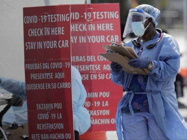 Jumlah kes Covid-19 di Amerika Syarikat (AS) melebihi 21 juta, lapor Agensi Berita Sputnik, memetik Johns Hopkins University. - Foto AP