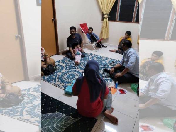 Mohd Razlan (kanan) mengunjungi keluarga berkenaan selepas membaca laporan Sinar Harian mengenai kesukaran mengikuti kelas dalam talian disebabkan tiada kelengkapan gajet.