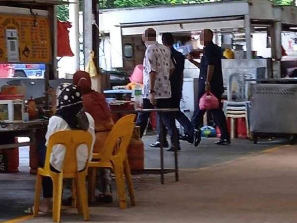 Gambar tular yang memaparkan anggota polis tidak memakai pelitup muka.