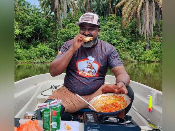 Memasak sardin di empangan Felda Klau, Raub Pahang.