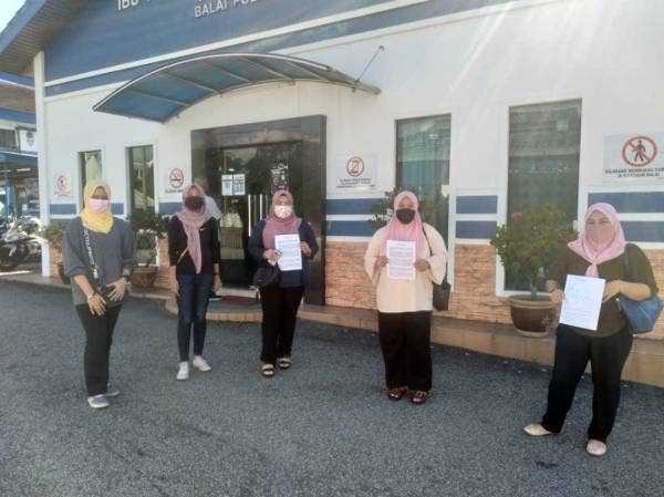 Puteri UMNO Perak membuat laporan polis terhadap Tommy Thomas di IPD Ipoh.