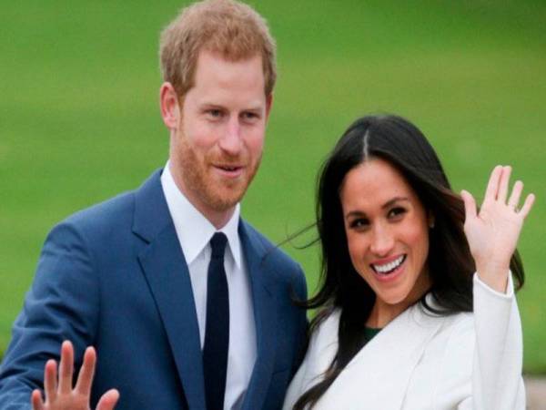Gambar fail Putera Harry dengan isterinya, Meghan Markle. - Foto AFP