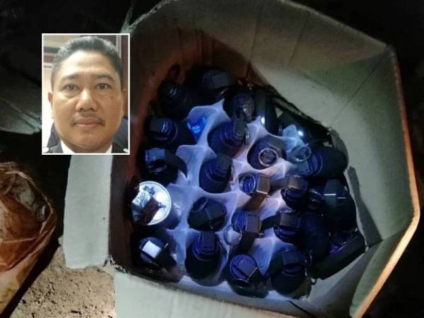 24 biji bom tangan yang diletakkan di dalam satu kotak ditemui di tempat pembuangan sampah di (Foto: Ihsan IPD Dungun), gambar kecil: Baharudin