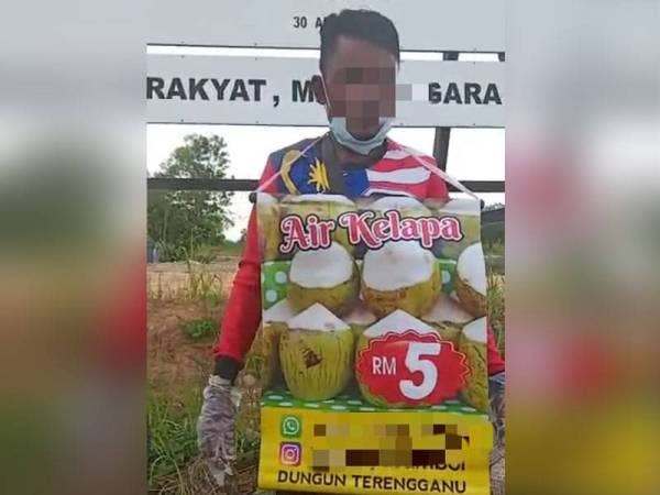 Seorang lagi warga Rohingya yang terlibat dalam penjualan air kelapa di persimpangan Sierra 16.