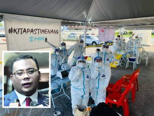 Antara petugas kesihatan yang bertugas semasa ujian saringan bersasar Covid-19 di PJS 6 pada Ahad. - Foto FB Amirudin Shari (Amirudin Shari)