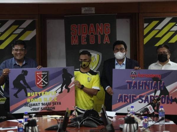 Arif menerima bantuan daripada kerajaan Perak yang diserahkan oleh Khairul Shahril (kiri) di Ipoh pada Selasa.