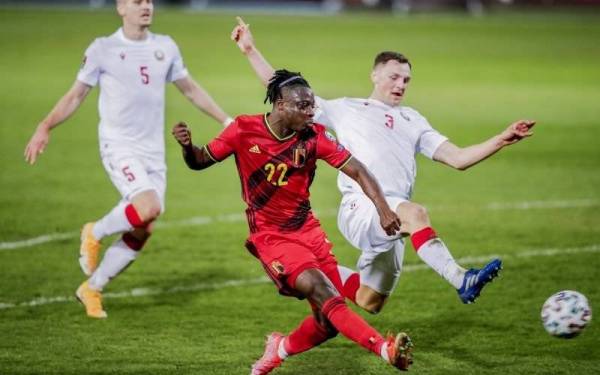 Jeremy Doku menjaringkan gol keempat Belgium pada perlawaan berkenaan