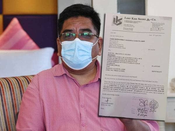 Hassan A Gani Pg Amir. Gambar kecil: Writ saman dihantar kepada Hassan di kediamannya di Taman Fulliwa, Kota Kinabalu.