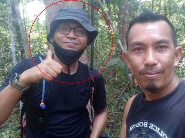 Mangsa (kiri) menyertai program Eksplorasi Ekopelancongan di kawasan hutan lipur Pulau Tali Kail, Tasik Banding.
