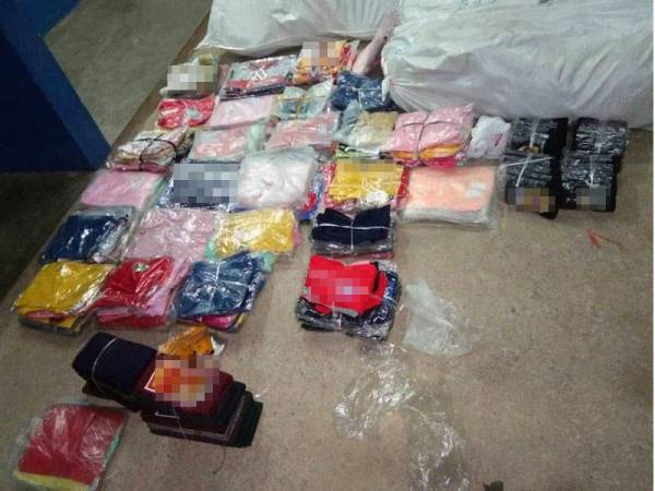 Pakaian yang dirampas oleh PGA Batalion 7 Kuantan berhampiran pangkalan haram Abe Yie.