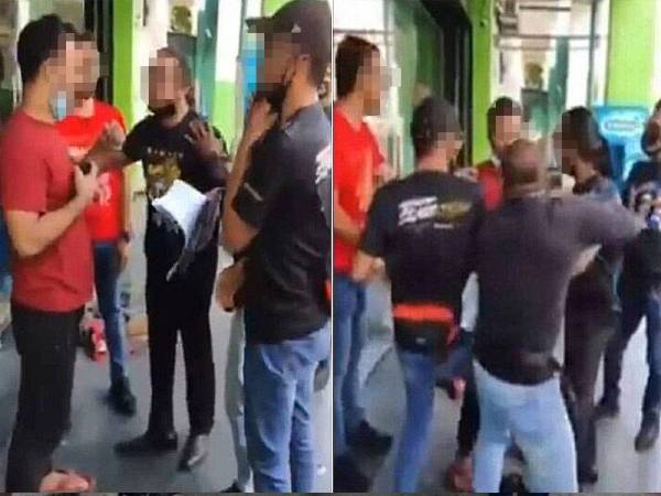 Tular satu rakaman video menunjukkan sekumpulan lima hingga enam lelaki mengepung dan menyoal seorang lelaki dipercayai warga asing di hadapan sebuah premis kedai.