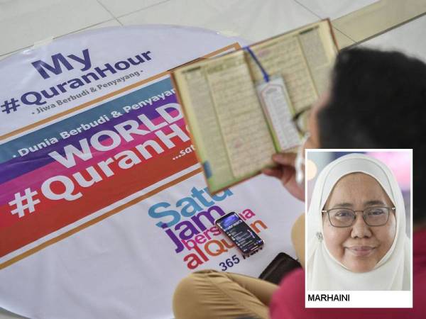 Peserta program World #QuranHour 1442H/2021 membaca surah Al-Mulk pada program yang bertemakan 'Dunia Berbudi dan Penyayang' di Masjid Tuanku Mizan Zainal Abidin pada Khamis.