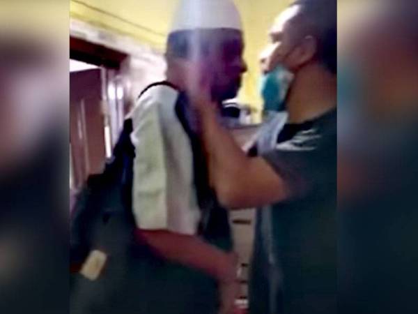 Petikan video memaparkan Mohd Shuhazlan memeluk bapanya yang positif Covid-19.