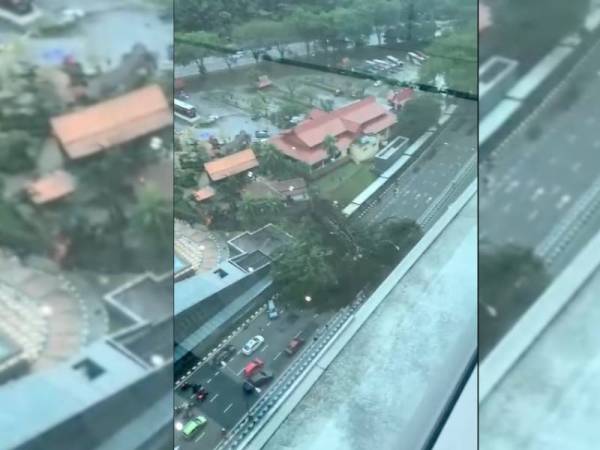 Tangkap layar rakaman video yang tular libat kejadian pokok tumbang di depan Muzium Negara petang tadi.