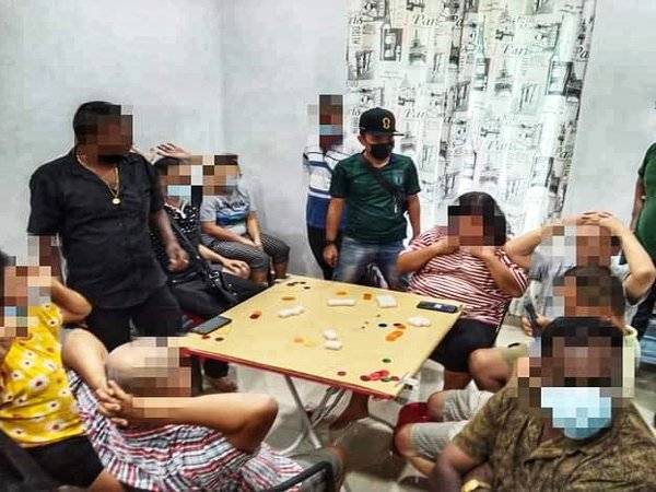 Seorang wanita warga Myanmar antara yang ditahan ketika serbuan di sebuah rumah di Taman Resak Changlun di sini pada Sabtu.