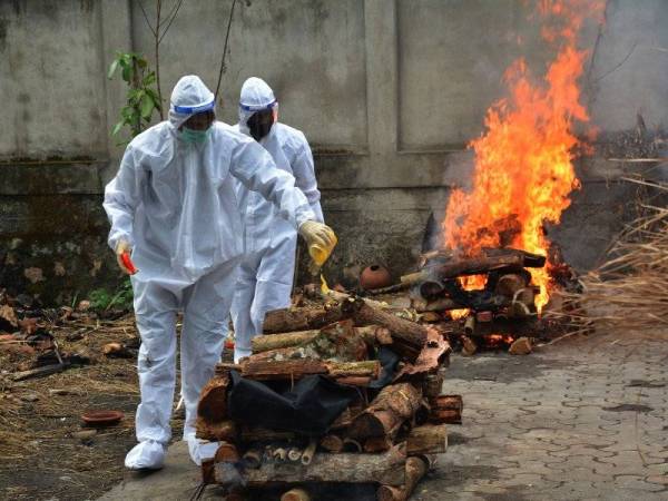 Kementerian Kesihatan India mengesahkan angka kematian Covid-19 India mencapai jumlah 351,309 pada Selasa. Foto Xinhua