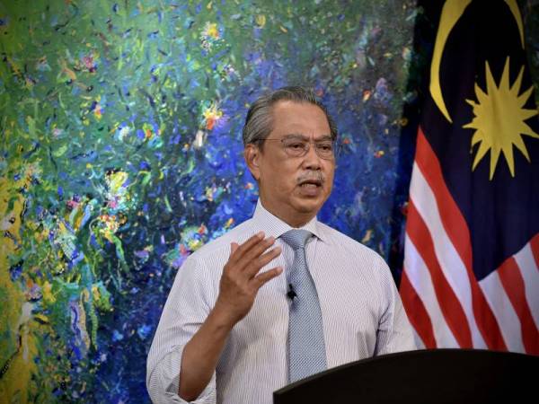 Muhyiddin ketika mengumumkan Pelan Pemulihan Negara: Peralihan Fasa PKP secara berperingkat yang disiarkan secara langsung di stesen-stesen televisyen petang ini. - Foto Bernama