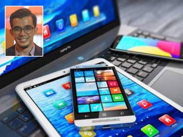 Pemberian peranti telefon pintar membantu mengurangkan jurang kadar keciciran pendidikan ketika era pandemik Covid-19. - Gambar hiasan
Gambar kecil: Muhammad Asree