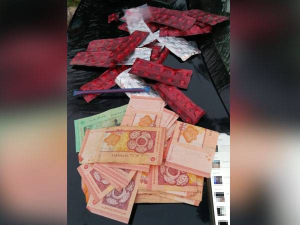 Sebahagian dadah dan wang tunai yang dirampas susulan penahanan suspek pada Selasa. - Foto PPM Wilayah Tiga