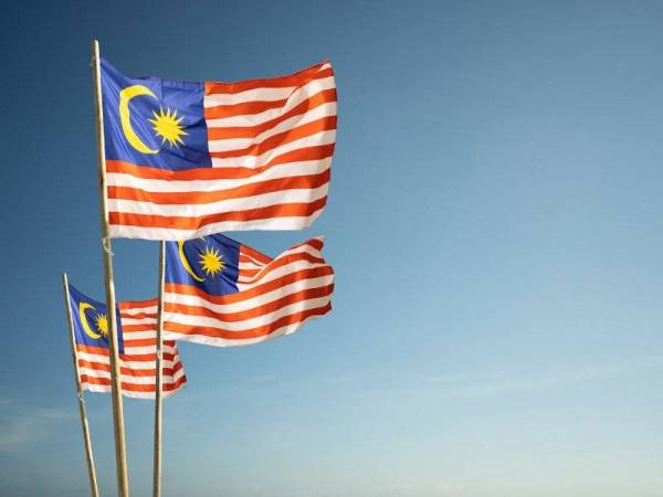 Tema Hari Kebangsaan tahun ini kekal seperti tahun lepas iaitu Malaysia Prihatin dan ia akan disambut secara sederhana. - Foto 123RF