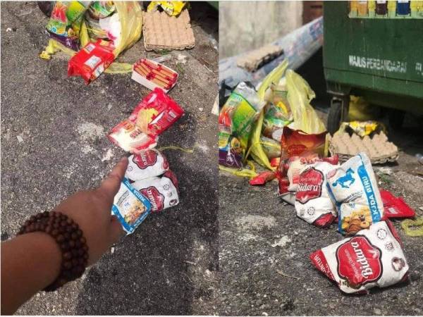 Makanan yang masih dalam keadaan elok ditemui bertaburan tepi tong sampah di Pekan Rawang baru-baru ini.