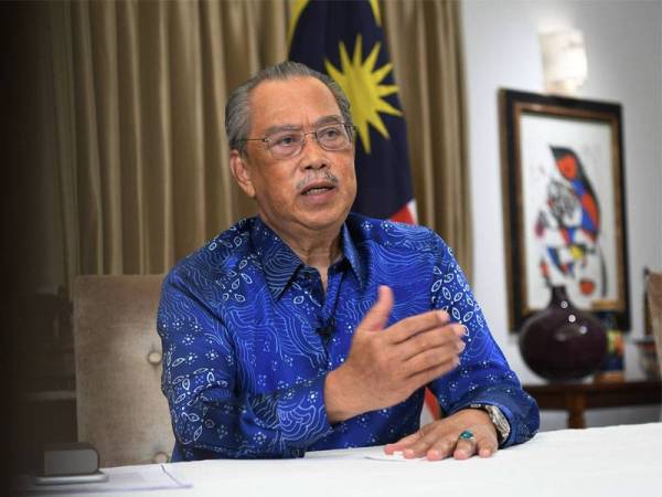 Muhyiddinketika menyampaikan pengumuman khas mengenai kemudahan bagi individu yang telah lengkap vaksinasi pada Ahad. - Foto Bernama