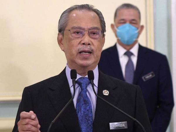 Perdana Menteri Tan Sri Muhyiddin Yassin ketika menyampaikan Perutusan Khas di Bangunan Perdana Putra hari ini. - Foto Bernama