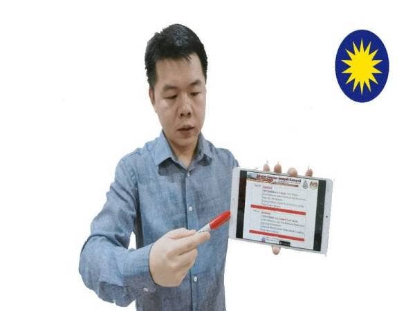 Guo Nan menunjukkan hasil semakan dua akaun yang digunakan sindiket menerusi aplikasi Semak Mule. - Foto Ihsan MCA