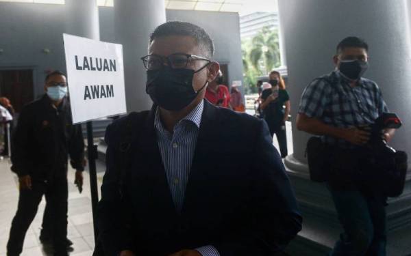 Mohd Hazem hadir di Kompleks Mahkamah Kuala Lumpur sebagai saksi perbicaraan kes pertuduhan rasuah dan pengubahan wang haram membabitkan dana 1MDB berjumlah RM2.3 bilion.- Foto Bernama