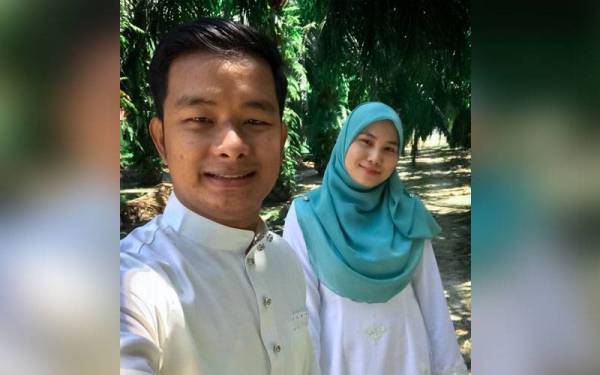 Gambar kenangan Nur Syahirah dan suaminya Mohd Nur Hisham. - Foto Bernama