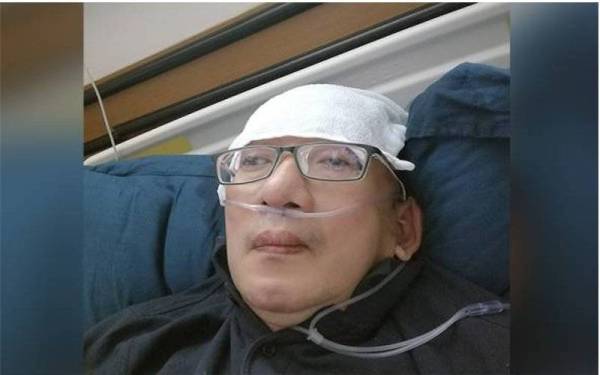 Selain Najman, isterinya, Hawa Atan dan dua anaknya, Amirul Akidd dan Amirul Akiff juga disahkan positif Covid-19. - Facebook / Najman Mohamed