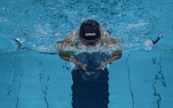 Muhammad Nur Syaiful beraksi dalam saringan satu 100 meter kuak dada lelaki (SB4) di Pusat Akuatik Tokyo pada Ahad. Penyertaan Muhammad dibatalkan akibat masalah teknikal. - FOTO: BERNAMA
