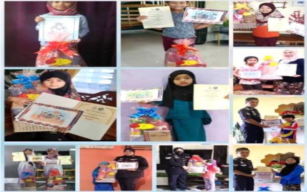 Pemenang menunjukkan sijil dan hadiah hamper yang dimenangi masing-masing. - Foto IPD Bachok