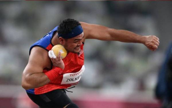 Ziyad Zokefli ketika beraksi pada acara lontar peluru F20 (kategori masalah pembelajaran) pada Sukan Paralimpik Tokyo 2020 di Stadium Olimpik pada Selasa.- Foto Bernama