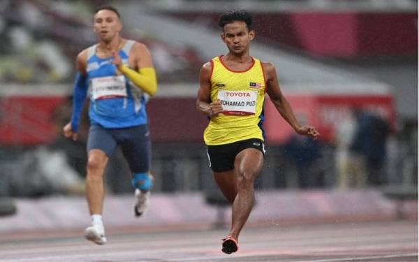 Mohamad Ridzuan mara ke final acara 100m T36 lelaki pada temasya Sukan Paralimpik Tokyo 2020 di Stadium Olimpik Tokyo. - Foto Bernama
