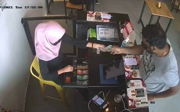 Polis buru lelaki dipercayai terbabit dalam kes tipu sebuah restoran seperti dirakam dalam CCTV pada Selasa.