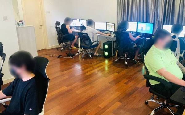 Antara suspek yang diberkas menerusi serbuan di sebuah premis di Mont Kiara, Kuala Lumpur pada Ahad.