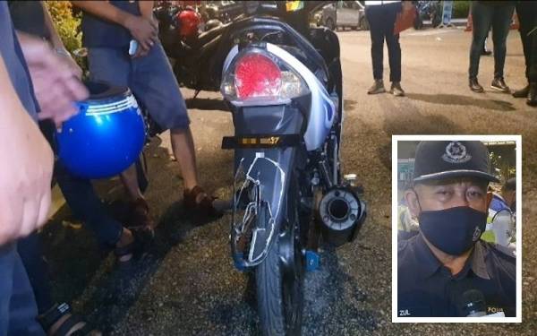 Nombor pendaftaran digunakan penunggang motosikal yang dikenakan tindakan saman ketika Ops Samseng Jalanan di Jalan Tun Razak di sini lewat pada malam Rabu. (Gambar kecil: Zulkafly)